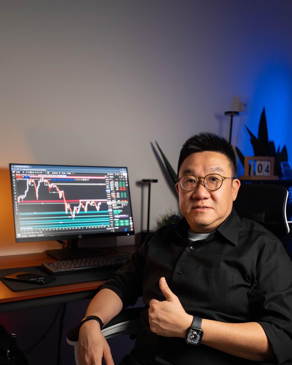 Uncle Lim at his trading desk
